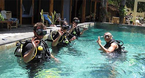 Scuba dive students in pool